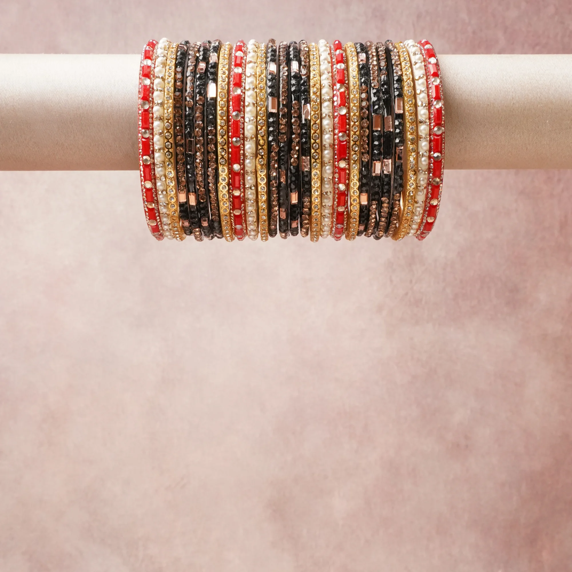 A grounding Green forms the heart of the set, while touches of Red, Gold, Rose Gold, Cream add charm.

A thoughtful composition of Metal Alloy, Glass/Crystal, Faux Pearl, Enamel/Lacquer, designed to feel complete without being heavy.
Each element layers seamlessly, creating a look that is refined, wearable and quietly striking.